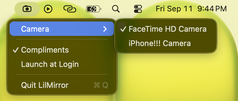 LilMirror settings menu showing camera picker, compliments toggle, launch at login, and quit